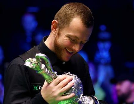 World Grand Prix: Mark Allen survives scare to beat Judd Trump in dramatic final