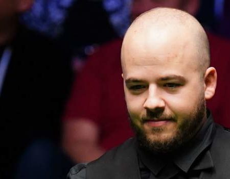 World Snooker Championship 2023 final: Luca Brecel extends lead over Mark Selby